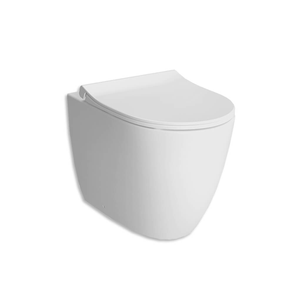 Sanitari Vitra filo muro di colore bianco opaco e scarico rimless